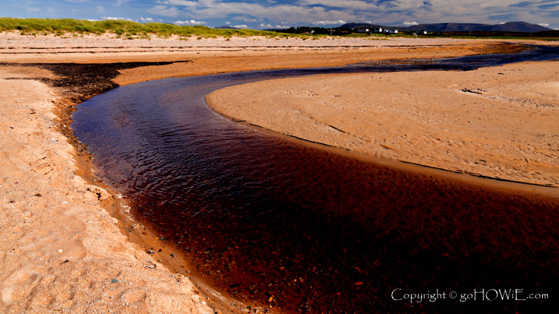 Beach and river at Dugort on Achill Island, County Mayo, Ireland