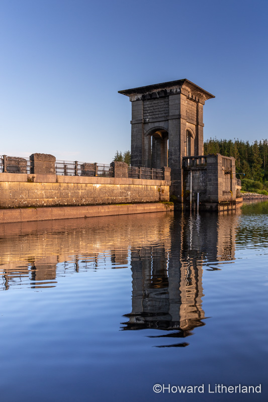 Alwen reservoir dam with reflection, North Wales on a sunny afternoon