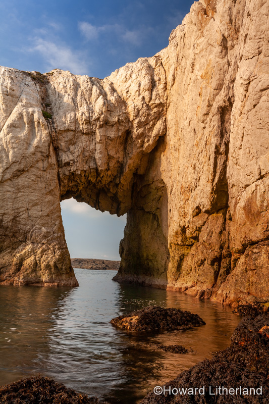 Bwa Gwyn sea arch near Rhoscolyn, Anglesey, North Wales