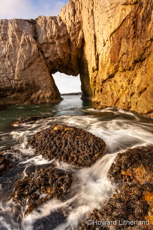 Bwa Gwyn sea arch near Rhoscolyn, Anglesey, North Wales