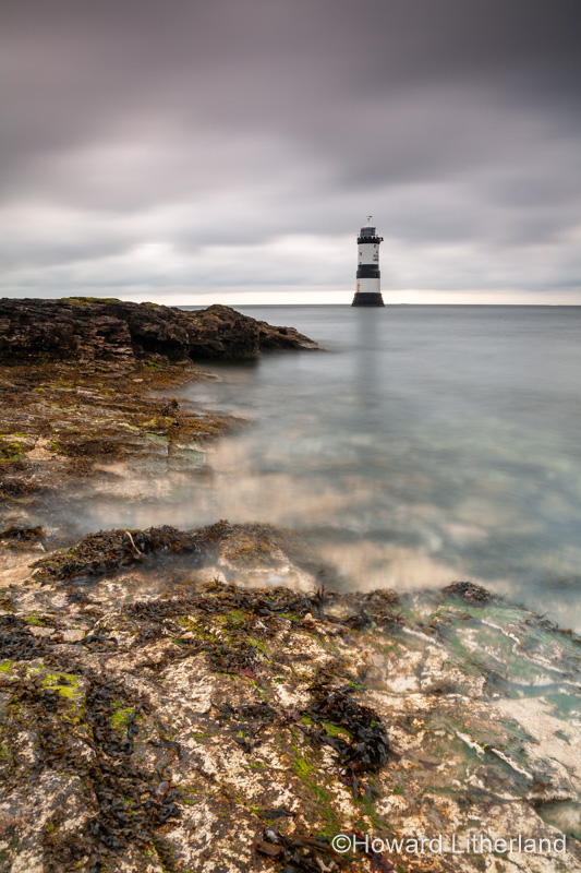 Penmon Point lighthouse on the coast of Anglesey, North Wales