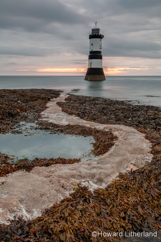 Penmon Point lighthouse at dawn, Anglesey, North Wales