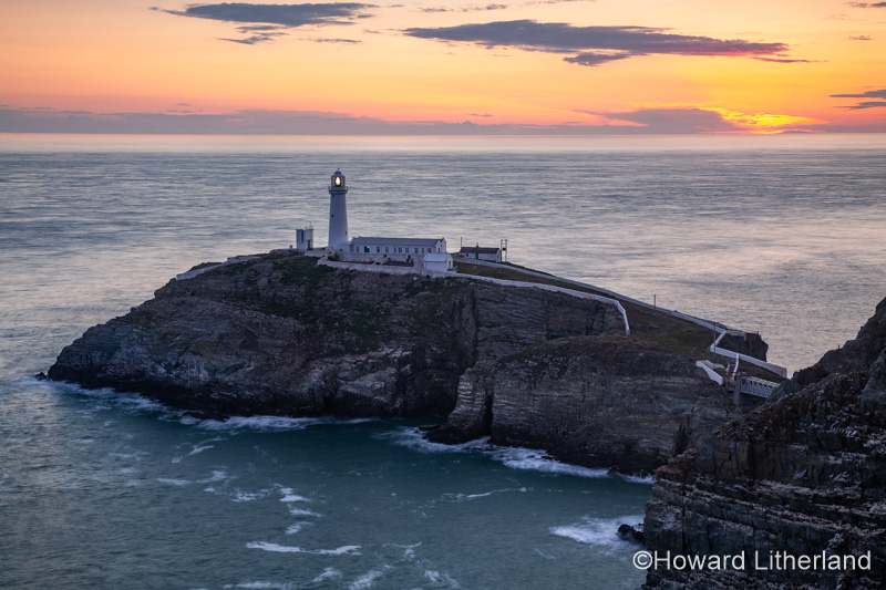 South Stack lighthouse at sunset, Anglesey on the North Wales coast
