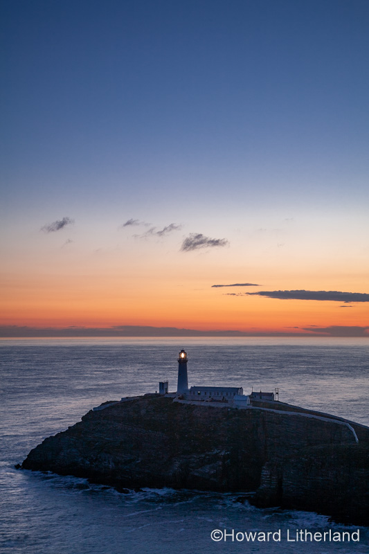 South Stack lighthouse at sunset, Anglesey on the North Wales coast