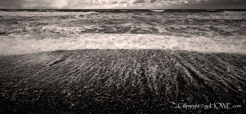 Beach with receding wave