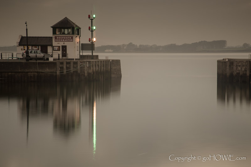 Caernarfon harbour entrance at dusk, North Wales