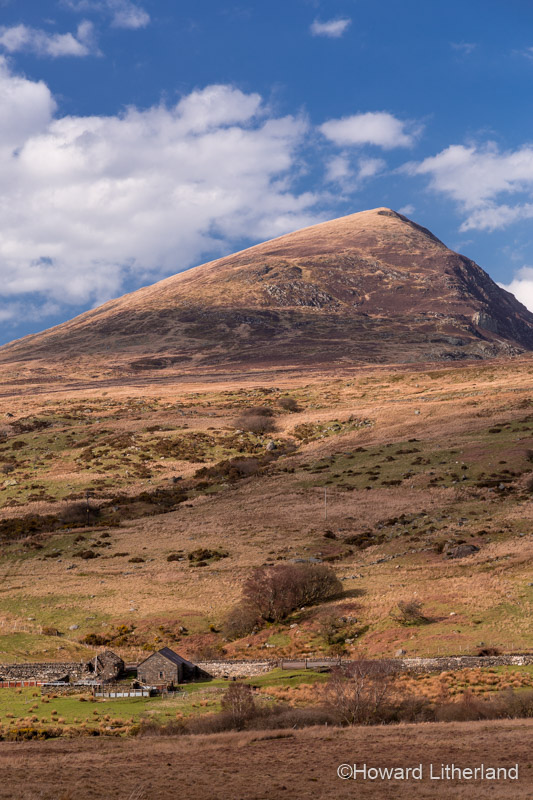 Clouds, mountains and isolated farm at Capel Curig in the Snowdonia National Park, North Wales