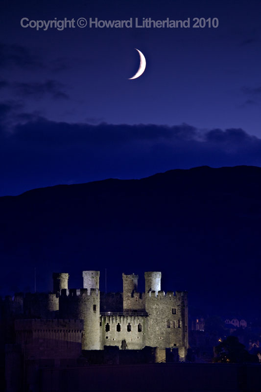 Moon over Conway castle, North Wales