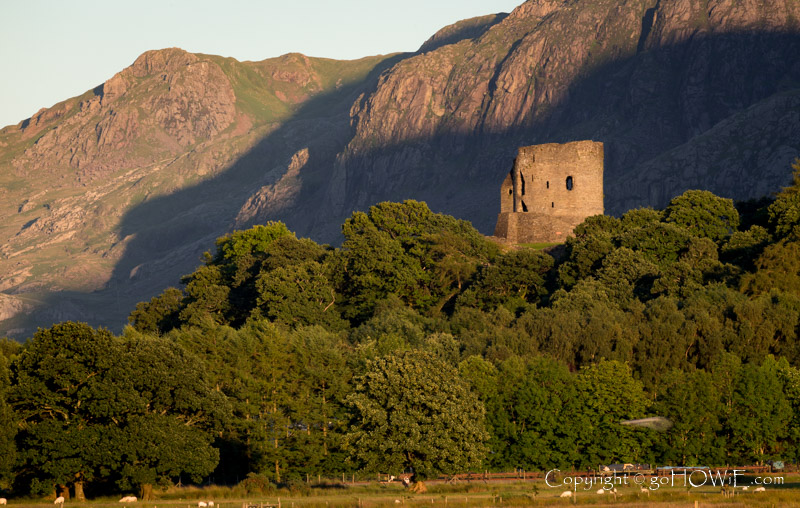 Dolbadarn Castle on the shores of Llyn Padarn, set against the mountains of the Snowdonia National Park, North Wales