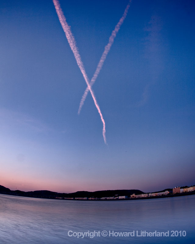 Aircraft contrails, Llandudno, North Wales