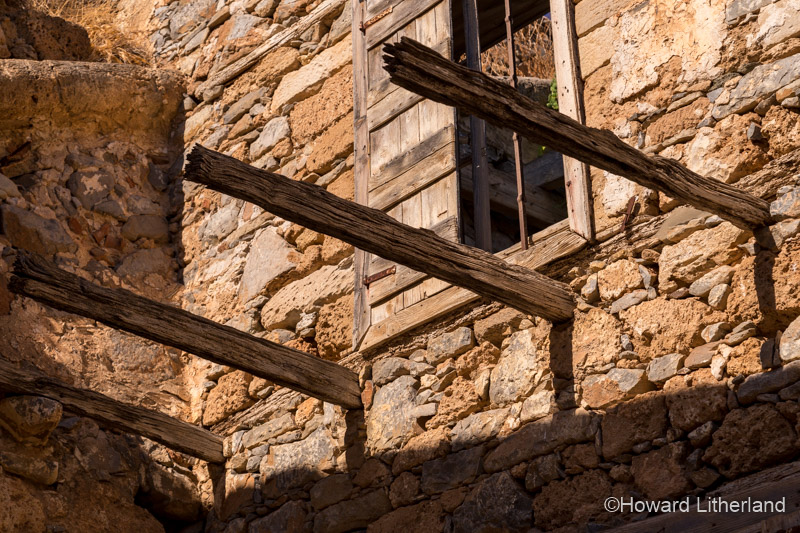 Old decaying wooden joists on the island of Spinalonga, Crete