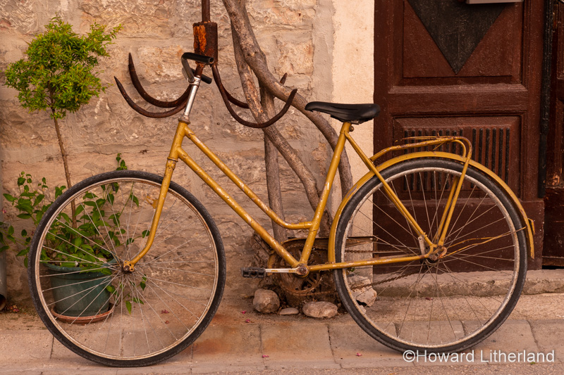 Bicycle leaning on a wall at Skradin, Croatia