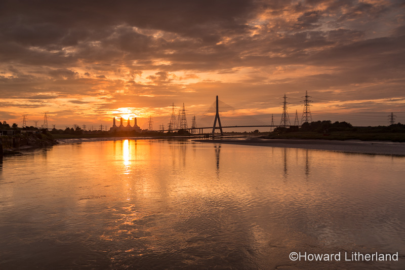 Connah's Quay power station and suspension bridge at sunset, Deeside, North Wales