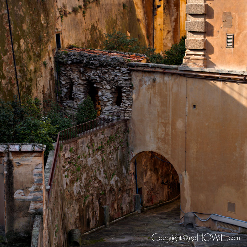 A section of the Pitti Palace showing archways and steps, Florence, Italy