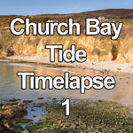 Time lapse video showing the tide coming in up the beach at Church Bay on Anglesey, North Wales coast, at sunset