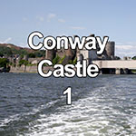 Conwy castle and railway bridge from the Conwy estuary, North Wales