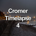 Time lapse video showing dusk and night with billowing fog over Cromer Pier on the North Sea coast, Norfolk, England