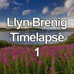 Time lapse video showing summer clouds over Llyn Brenig reservoir in North Wales, with small boats moored near the shore