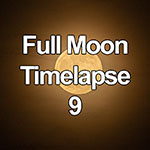 Time lapse of a full moon rising through light cloud