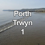 Video showing gentle waves breaking on the sand at Porth Trwyn on the island of Anglesey, North Wales