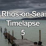 Time lapse video showing an ebbing tide as dusk falls over Colwyn Bay at Rhos-on-Sea on the North Wales coast