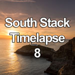 Time lapse video showing sunset and dusk with a ferry sailing by the South Stack lighthouse on the Isle of Anglesey, North Wales