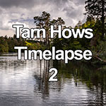 Time lapse of summer clouds over Tarn Hows lake in the Lake District, England