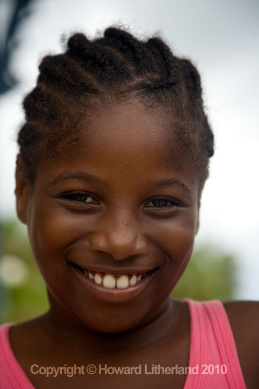 Young girl smiling, St Martin, Carribean