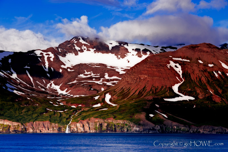 Snow capped mountains at the side of the Eyjafjordur fjord, Akureyri, Iceland. Viewed from the P&O liner Azura