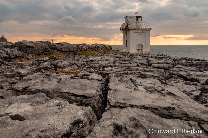 Black Head lighthouse and limestone pavement, Burren, County Clare, Ireland
