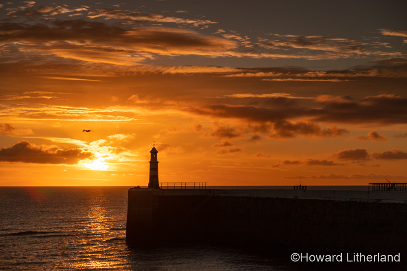 Ramsey harbour breakwater at sunrise, Isle of Man