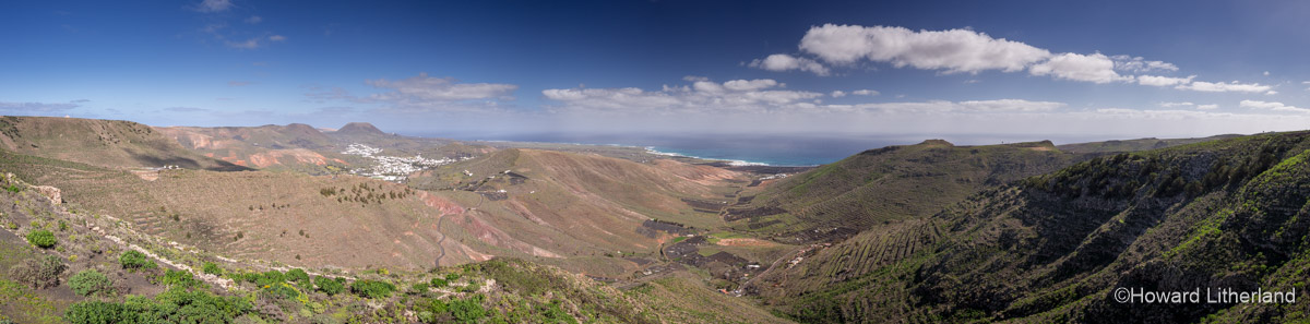 Panoramic image of rugged volcanic landscape around Haria on Lanzarote in the Canary Islands
