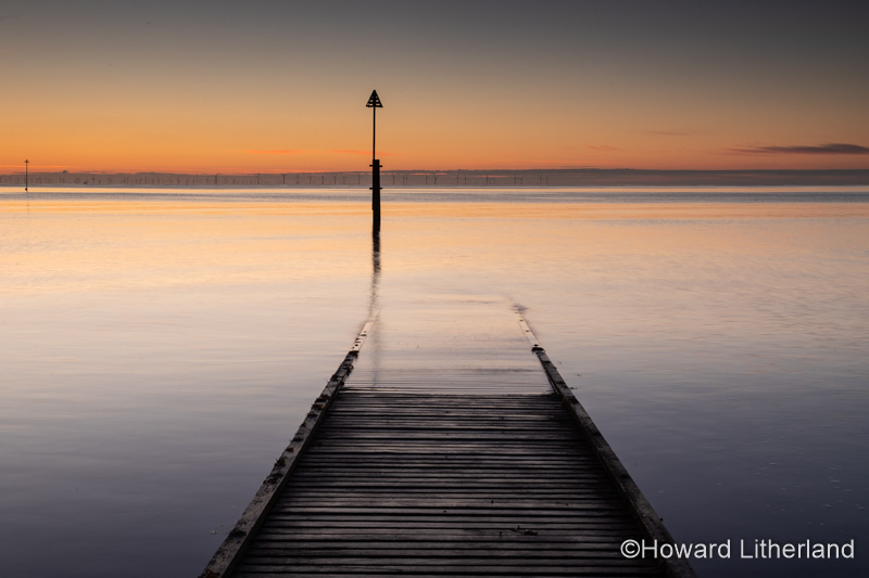 Jetty at dawn on Llandudno North Shore, North Wales