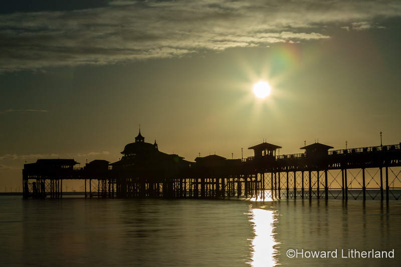 Pier at sunrise on Llandudno North Shore, North Wales