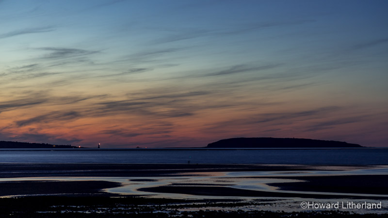 The beach at Llanfairfechan at dusk on the North Wales coast
