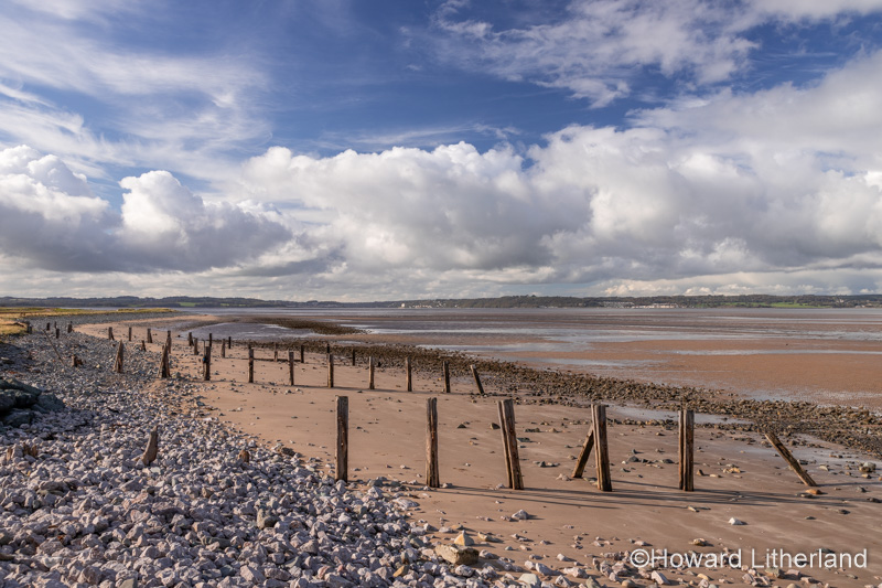 Beach with groynes at Llanfairfechan, North Wales coast
