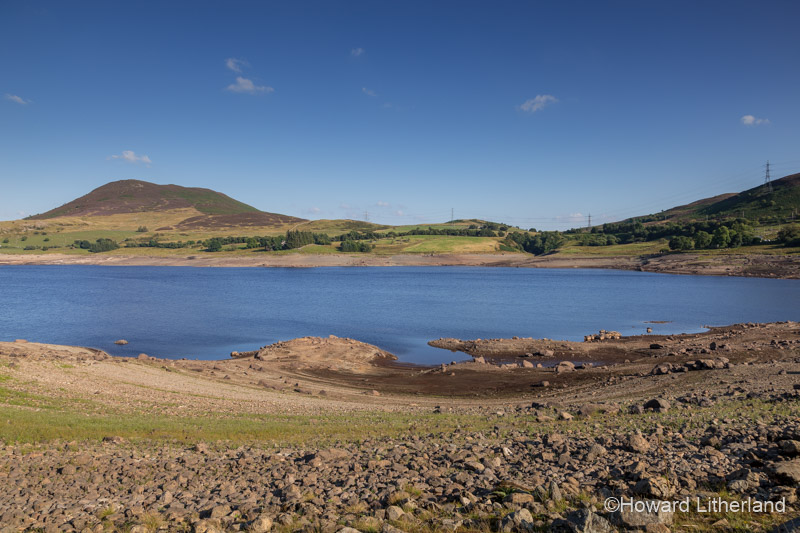 Llyn Celyn reservoir in Snowdonia National Park, North Wales, with low water levels during the drought of summer 2018
