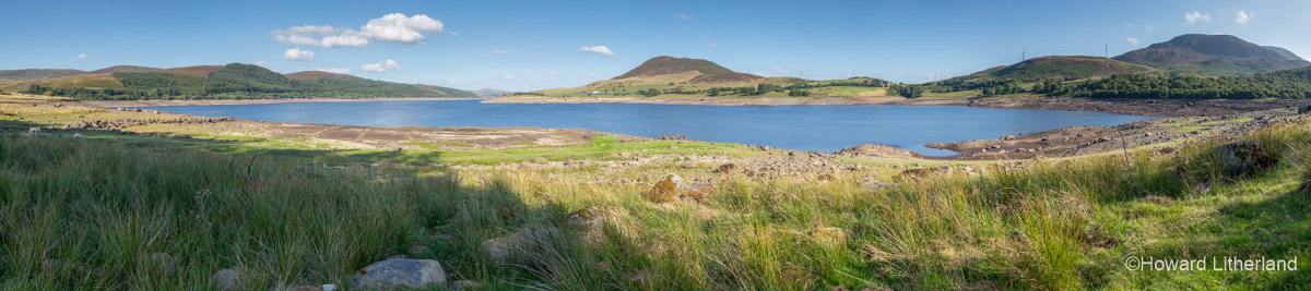 Llyn Celyn reservoir in Snowdonia National Park, North Wales, with low water levels during the drought of summer 2018