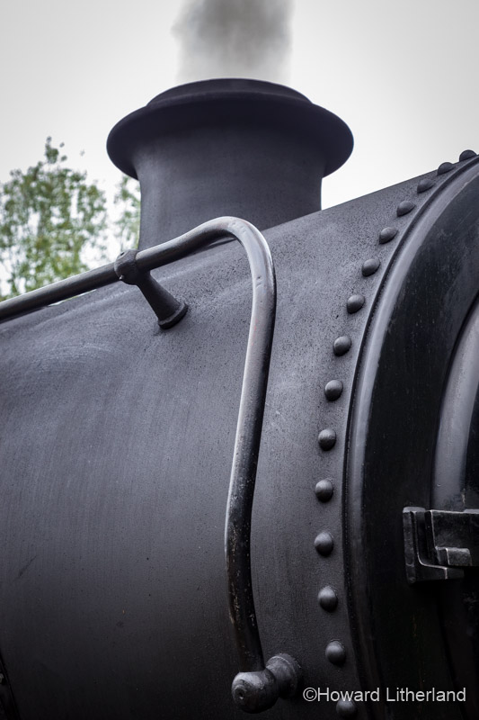 Engineering detail on a steam train at Waybourne station, Norfolk, England