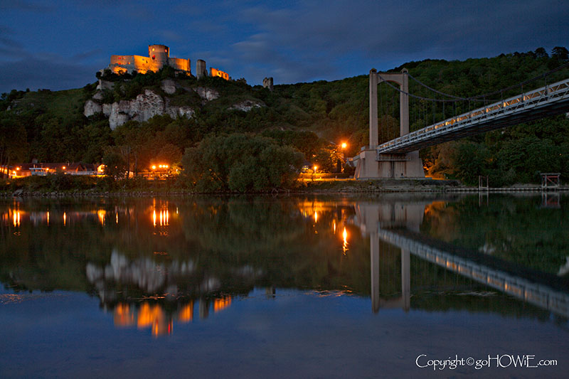 Chateau Gaillard at dusk reflecting in the river Seine at Les Andelys, Normandy, France