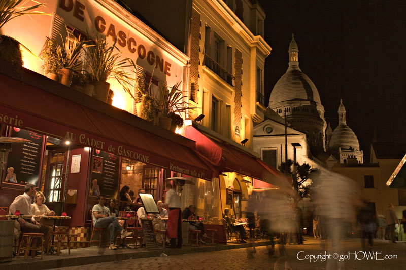 Place du Tertre at night, Montmartre, Paris, with the Sacre Coeur in the background