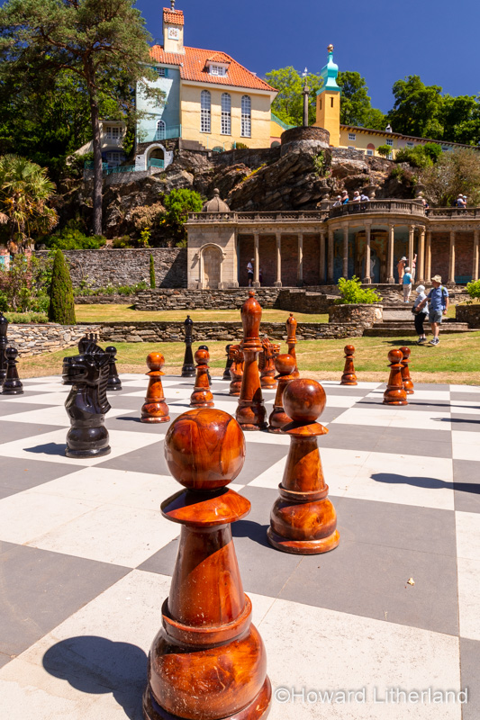 Large wooden outdoor chess game at Portmeirion, Wales