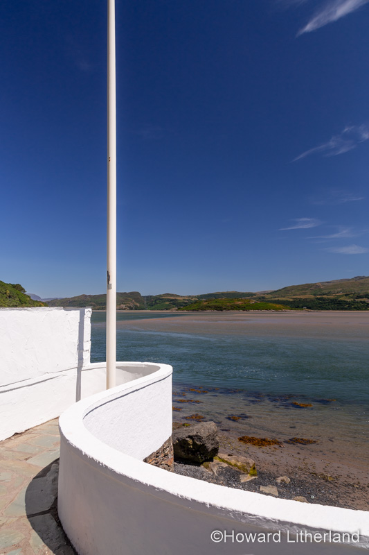 White wall promenade by the sea at Portmeirion, North Wales