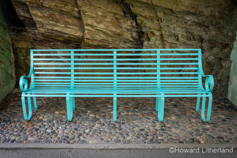 Painted steel bench at Portmeirion, North Wales