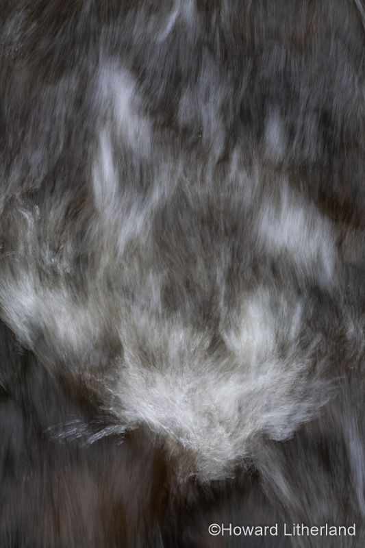 Turbulent river water with motion blur