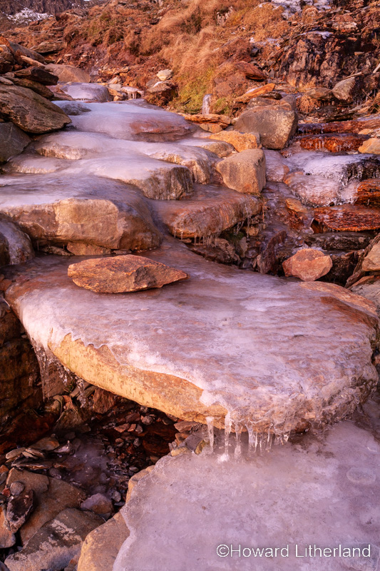 Ice covered stone path in winter, Snowdonia, north Wales