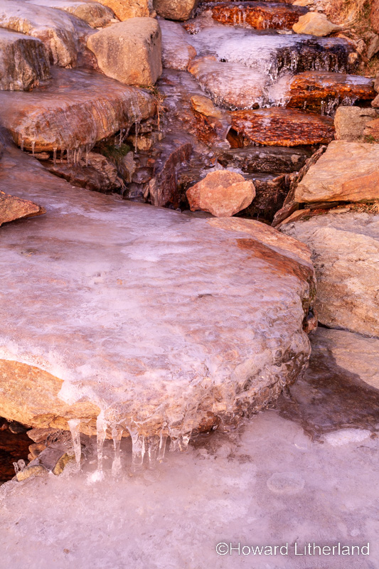 Ice covered stone path in winter, Snowdonia, north Wales