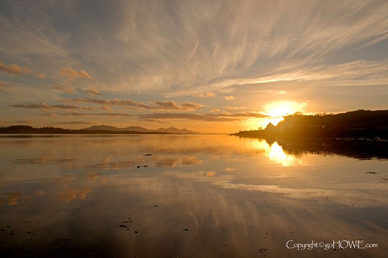 The setting sun reflecting in the Menai Straits, Anglesey