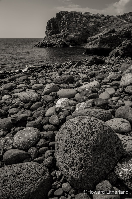 Volcanic rock beach near Los Abrigos on the south coast of Tenerife in the Canary Islands