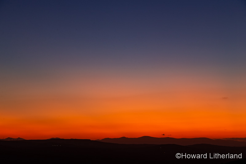 Vale of Clwyd and Snowdonia mountains at dusk, North Wales